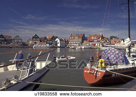 Netherlands, Holland, Volendam, Noord-Holland, Europe, Boats docked in the harbor on Markermeer in the town of Volendam. View Large Photo Image Stock Photo - Netherlands, Holland, Volendam, Noord-Holland, Europe, Boats docked in the harbor on Markermeer in the town of Volendam.. Fotosearch