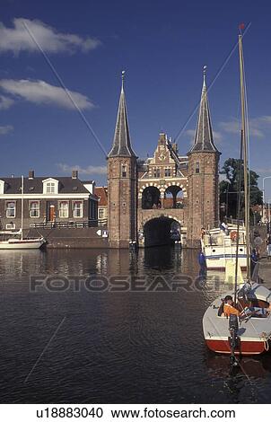 Netherlands, Sneek, Holland, Friesland, Europe, Water Tower (1613) along the canal in downtown Sneek. View Large Photo Image Stock Image - Netherlands, Sneek, Holland, Friesland, Europe, Water Tower (1613) along the canal in downtown Sneek.. Fotosearch