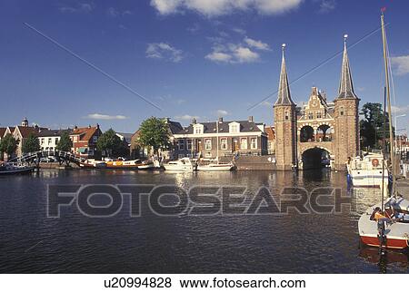 Netherlands, Sneek, Holland, Friesland, Europe, Water Tower (1613) along the canal in downtown Sneek. View Large Photo Image Stock Photo - Netherlands, Sneek, Holland, Friesland, Europe, Water Tower (1613) along the canal in downtown Sneek.. Fotosearch
