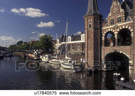Netherlands, Sneek, Holland, Friesland, Europe, Water Tower (1613) along the canal in downtown Sneek. View Large Photo Image Stock Photography - Netherlands, Sneek, Holland, Friesland, Europe, Water Tower (1613) along the canal in downtown Sneek.. Fotosearch