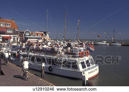 Netherlands, Volendam, Holland, Noord-Holland, Europe, Excursion boat at the waterfront on the harbor on Markermeer in the town of Volendam. View Large Photo Image Stock Photograph - Netherlands, Volendam, Holland, Noord-Holland, Europe, Excursion boat at the waterfront on the harbor on Markermeer in the town of Volendam.. Fotosearch