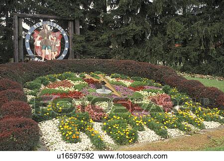 Stock Image -  New Glarus, WI, Wisconsin, Floral Clock at Little Switzerland in New Glarus.. Fotosearch