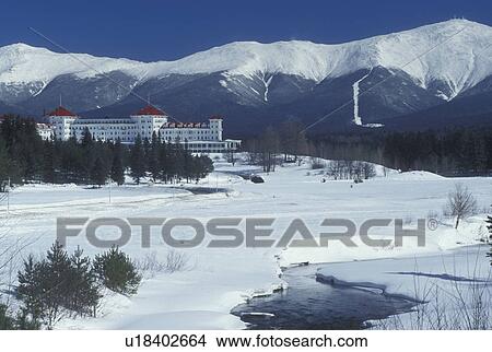 NH, Bretton Woods, hotel, New Hampshire, Scenic view of Historic Mount Washington Hotel & Resort and Mt. Washington in winter in the White Mountains National Forest. View Large Photo Image Picture - NH, Bretton Woods, hotel, New Hampshire, Scenic view of Historic Mount Washington Hotel & Resort and Mt. Washington in winter in the White Mountains National Forest.. Fotosearch