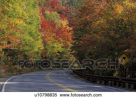 NH, New Hampshire, road, White Mountain National Forest, Merrimack River Valley, Scenic Kancamagus Highway surrounded by colorful fall foliage in the autumn in the White Mountain Nat'l Forest. View Large Photo Image Stock Photography - NH, New Hampshire, road, White Mountain National Forest, Merrimack River Valley, Scenic Kancamagus Highway surrounded by colorful fall foliage in the autumn in the White Mountain Nat'l Forest.. Fotosearch