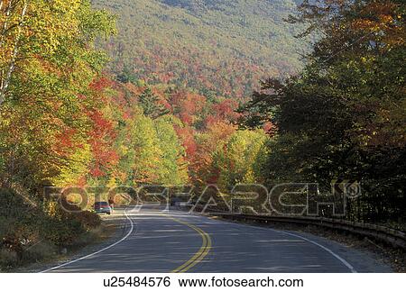 NH, road, New Hampshire, White Mountain National Forest, Merrimack River Valley, Scenic Kancamagus Highway surrounded by colorful fall foliage in the autumn in the White Mountain Nat'l Forest. View Large Photo Image Stock Photograph - NH, road, New Hampshire, White Mountain National Forest, Merrimack River Valley, Scenic Kancamagus Highway surrounded by colorful fall foliage in the autumn in the White Mountain Nat'l Forest.. Fotosearch