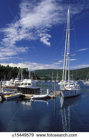 Stock Photo -  Northeast Harbor, ME, Maine, Mount Desert Island, Boats docked at the marina in Northeast Harbor on the Atlantic Ocean.. Fotosearch