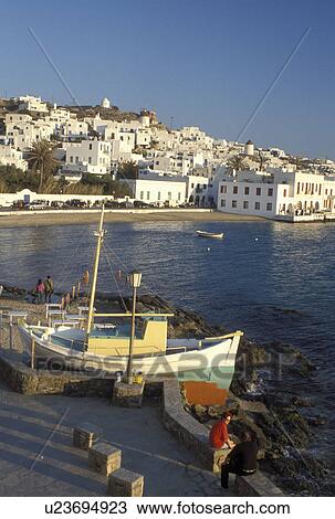 octopus, Mykonos, Greek Islands, Cyclades, Greece, Europe, Octopus drying on a fishing boat on the waterfront in Mykonos Harbor on the Aegean Sea. View Large Photo Image Stock Image - octopus, Mykonos, Greek Islands, Cyclades, Greece, Europe, Octopus drying on a fishing boat on the waterfront in Mykonos Harbor on the Aegean Sea.. Fotosearch