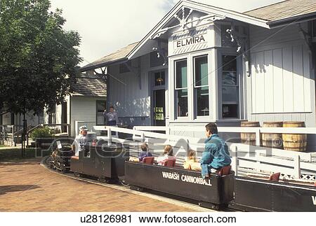 OH, Ohio, Archbold, Small train driven by an engineer loads passengers at the Elmira Depot at the Historic Sauder Farm and Craft Village. View Large Photo Image Stock Image - OH, Ohio, Archbold, Small train driven by an engineer loads passengers at the Elmira Depot at the Historic Sauder Farm and Craft Village.. Fotosearch