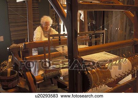 OH, Ohio, Archbold, Woman works on a loom inside Barbara's Weaving Shop at the Historic Sauder Farm and Craft Village. View Large Photo Image Stock Image - OH, Ohio, Archbold, Woman works on a loom inside Barbara's Weaving Shop at the Historic Sauder Farm and Craft Village.. Fotosearch