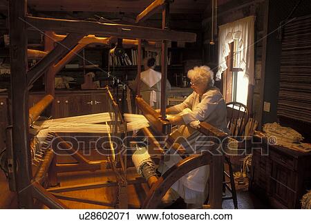 OH, Ohio, Archbold, Woman works on a loom inside Barbara's Weaving Shop at the Historic Sauder Farm and Craft Village. View Large Photo Image Stock Image - OH, Ohio, Archbold, Woman works on a loom inside Barbara's Weaving Shop at the Historic Sauder Farm and Craft Village.. Fotosearch