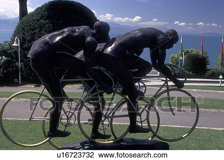 olympics, Lausanne, Switzerland, Ouchy, Vaud, Lac Leman, Statue of cyclists at Le Parc Olympique along Lake Geneva in Lausanne near the Olympic museum. View Large Photo Image Stock Image - olympics, Lausanne, Switzerland, Ouchy, Vaud, Lac Leman, Statue of cyclists at Le Parc Olympique along Lake Geneva in Lausanne near the Olympic museum.. Fotosearch