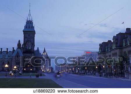 Stock Image -  Ottawa, Ontario, Canada, Buildings along the street on Parliament Hill in the evening.. Fotosearch