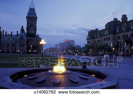 Ottawa, Ontario, Canada, Eternal Flame on Parliament Hill in the evening. View Large Photo Image Stock Image - Ottawa, Ontario, Canada, Eternal Flame on Parliament Hill in the evening.. Fotosearch