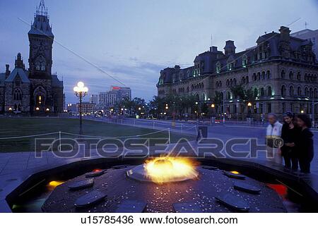 Ottawa, Ontario, Canada, Eternal Flame on Parliament Hill in the evening. View Large Photo Image Stock Photograph - Ottawa, Ontario, Canada, Eternal Flame on Parliament Hill in the evening.. Fotosearch
