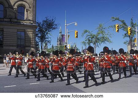 Ottawa, Ontario, Canada, Marching band marches down Elgin Street during the Changing of the Guard ceremony on Parliament Hill in the capital city of Ottawa. View Large Photo Image Stock Photo - Ottawa, Ontario, Canada, Marching band marches down Elgin Street during the Changing of the Guard ceremony on Parliament Hill in the capital city of Ottawa.. Fotosearch