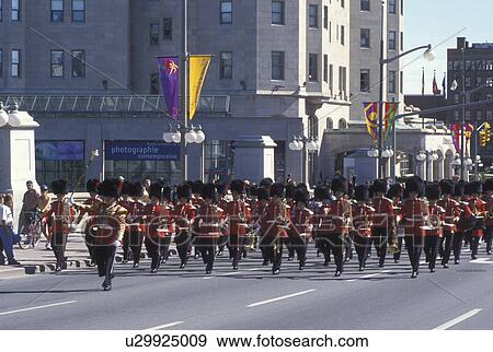 Ottawa, Ontario, Canada, Marching band marches down Elgin Street during the Changing of the Guard ceremony on Parliament Hill in the capital city of Ottawa. View Large Photo Image Stock Photo - Ottawa, Ontario, Canada, Marching band marches down Elgin Street during the Changing of the Guard ceremony on Parliament Hill in the capital city of Ottawa.. Fotosearch