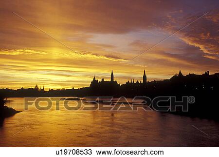 Ottawa, Ontario, Canada, Scenic view of Parliament Hill from the Ottawa River at sunrise. View Large Photo Image Stock Image - Ottawa, Ontario, Canada, Scenic view of Parliament Hill from the Ottawa River at sunrise.. Fotosearch
