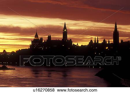 Ottawa, Ontario, Canada, Scenic view of Parliament Hill from the Ottawa River at sunrise. View Large Photo Image Stock Photo - Ottawa, Ontario, Canada, Scenic view of Parliament Hill from the Ottawa River at sunrise.. Fotosearch