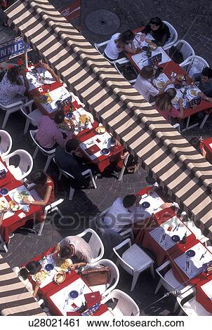 outdoor cafT, aerial, Geneva, Switzerland, Looking down at people eating at an outdoor cafT in the old town of the city of Geneva. View Large Photo Image Stock Image - outdoor cafT, aerial, Geneva, Switzerland, Looking down at people eating at an outdoor cafT in the old town of the city of Geneva.. Fotosearch
