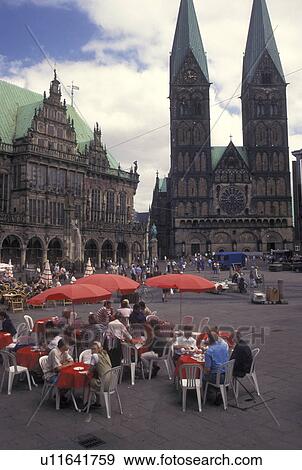 Stock Photo -  outdoor cafT, cathedral, Bremen, Germany, Europe, Outdoor cafTs and St Petri-Dom Am Markt in downtown Bremen.. Fotosearch
