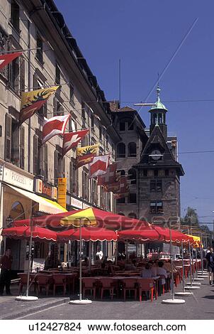 outdoor cafT, Geneva, Switzerland, Outdoor cafT with red umbrellas at Place du Molard in the old town of the city of Geneva. View Large Photo Image Picture - outdoor cafT, Geneva, Switzerland, Outdoor cafT with red umbrellas at Place du Molard in the old town of the city of Geneva.. Fotosearch