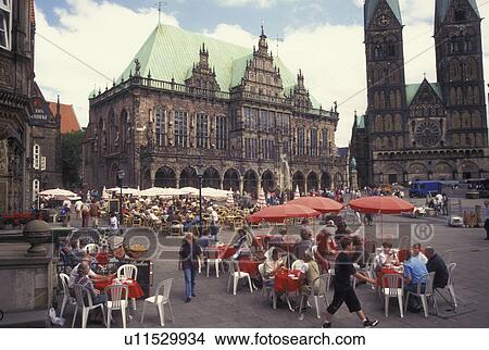 Picture -  outdoor cafT, Germany, Bremen, Europe, Outdoor cafTs Am Markt and St Petri-Dom in downtown Bremen.. Fotosearch