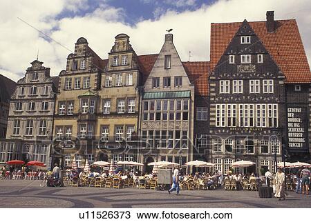 Stock Image -  outdoor cafT, Germany, Bremen, Europe, Outdoor cafTs Am Markt in downtown Bremen.. Fotosearch