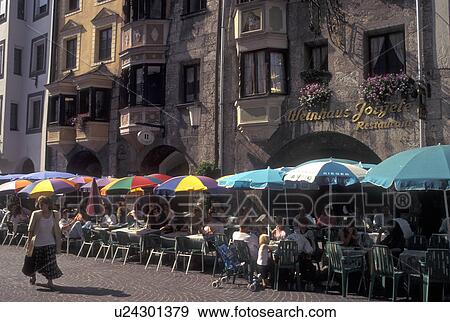 outdoor cafT, Innsbruck, Austria, Tirol, Outdoor cafes along a cobbled pedestrian street in the city of Innsbruck. View Large Photo Image Stock Photo - outdoor cafT, Innsbruck, Austria, Tirol, Outdoor cafes along a cobbled pedestrian street in the city of Innsbruck.. Fotosearch