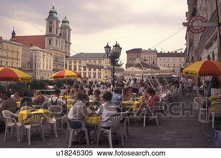 outdoor cafT, Linz, Austria, The Danube Valley, Oberosterreich, Outdoor cafT at the Hauptplatz in downtown Linz. View Large Photo Image Stock Photography - outdoor cafT, Linz, Austria, The Danube Valley, Oberosterreich, Outdoor cafT at the Hauptplatz in downtown Linz.. Fotosearch