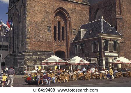 outdoor cafT, Netherlands, Holland, Groningen, Europe, Outdoor cafT in the town square outside Martinikerk (church) in downtown Groningen. View Large Photo Image Stock Photo - outdoor cafT, Netherlands, Holland, Groningen, Europe, Outdoor cafT in the town square outside Martinikerk (church) in downtown Groningen.. Fotosearch