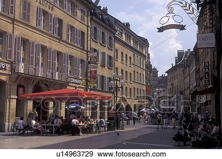Stock Photo -  outdoor cafT, Neuchatel, Switzerland, Outdoor cafT and shops along a pedestrian street in downtown Neuchatel.. Fotosearch