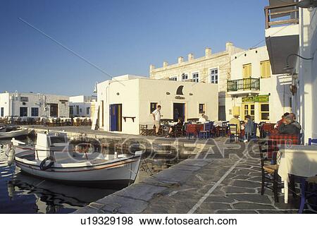 outdoor cafT, Paros, Greek Islands, Naoussa, Cyclades, Greece, Europe, Outdoor cafT on the waterfront on Naoussa Harbor on Paros Island on the Aegean Sea. View Large Photo Image Stock Photo - outdoor cafT, Paros, Greek Islands, Naoussa, Cyclades, Greece, Europe, Outdoor cafT on the waterfront on Naoussa Harbor on Paros Island on the Aegean Sea.. Fotosearch