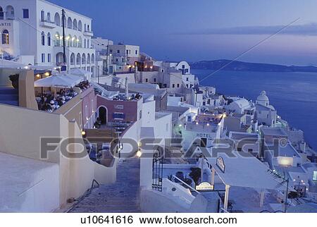 outdoor cafT, Santorini, Greece, Greek Islands, Fira, Cyclades, Europe, Outdoor restaurants and terraces in the village of Fira in the evening on the steep hillside of Santorini Island overlooking the Aegean Sea. View Large Photo Image Stock Photograph - outdoor cafT, Santorini, Greece, Greek Islands, Fira, Cyclades, Europe, Outdoor restaurants and terraces in the village of Fira in the evening on the steep hillside of Santorini Island overlooking the Aegean Sea.. Fotosearch