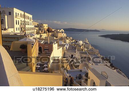 outdoor cafT, Santorini, Greek Islands, Fira, Cyclades, Greece, Europe, Outdoor restaurants and terraces in the village of Fira on the steep hillside of Santorini Island overlooking the Aegean Sea. View Large Photo Image Stock Photograph - outdoor cafT, Santorini, Greek Islands, Fira, Cyclades, Greece, Europe, Outdoor restaurants and terraces in the village of Fira on the steep hillside of Santorini Island overlooking the Aegean Sea.. Fotosearch