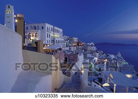 outdoor cafT, Santorini, Greek Islands, Fira, Cyclades, Greece, Europe, Outdoor restaurants and terraces in the village of Fira in the evening on the steep hillside of Santorini Island overlooking the Aegean Sea. View Large Photo Image Stock Photography - outdoor cafT, Santorini, Greek Islands, Fira, Cyclades, Greece, Europe, Outdoor restaurants and terraces in the village of Fira in the evening on the steep hillside of Santorini Island overlooking the Aegean Sea.. Fotosearch