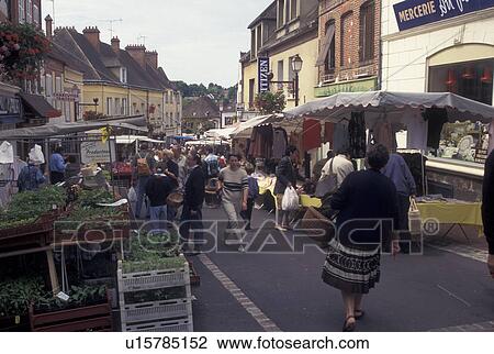 Stock Image -  outdoor market, Burgundy, France, Toucy, Yonne, Bourgogne, Europe, Market Day in downtown Toucy in the region of Burgundy.. Fotosearch