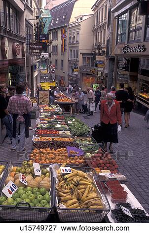 Stock Photo -  outdoor market, Switzerland, Lausanne, Vaud, Produce for sale at the open air market in the city of Lausanne.. Fotosearch