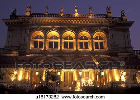 Stock Image -  outdoor restaurant, cafT, Vienna, Austria, Wien, Outdoor restaurant at Kursalon in City Park in Vienna in the evening.. Fotosearch