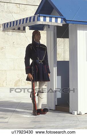 Parliament, Athens, Greece, Europe, Guard of Honor (evzones) standing at his post at the House of the Greek Parliament at Plateia Syntagmatos (Constitution Square) in downtown Athens. View Large Photo Image Stock Image - Parliament, Athens, Greece, Europe, Guard of Honor (evzones) standing at his post at the House of the Greek Parliament at Plateia Syntagmatos (Constitution Square) in downtown Athens.. Fotosearch