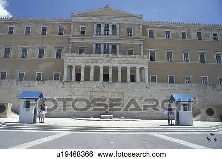 Parliament, Athens, Greece, Europe, Guards of Honor (evzones) standing at their post at the House of the Greek Parliament at Plateia Syntagmatos (Constitution Square) in downtown Athens. View Large Photo Image Stock Photograph - Parliament, Athens, Greece, Europe, Guards of Honor (evzones) standing at their post at the House of the Greek Parliament at Plateia Syntagmatos (Constitution Square) in downtown Athens.. Fotosearch