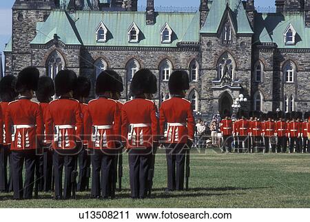 Parliament, Ottawa, Ontario, Canada, Changing of the Guard on the lawn of Parliament Hill in the capital city of Ottawa. View Large Photo Image Stock Image - Parliament, Ottawa, Ontario, Canada, Changing of the Guard on the lawn of Parliament Hill in the capital city of Ottawa.. Fotosearch