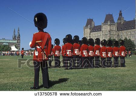 Parliament, Ottawa, Ontario, Canada, Changing of the Guard on the lawn of Parliament Hill in the capital city of Ottawa. View Large Photo Image Stock Photo - Parliament, Ottawa, Ontario, Canada, Changing of the Guard on the lawn of Parliament Hill in the capital city of Ottawa.. Fotosearch