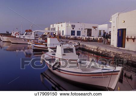 Paros, Greece, Greek Islands, Naoussa, Cyclades, Europe, Fishing boats docked on the waterfront on Naoussa Harbor on Paros Island on the Aegean Sea. View Large Photo Image Stock Image - Paros, Greece, Greek Islands, Naoussa, Cyclades, Europe, Fishing boats docked on the waterfront on Naoussa Harbor on Paros Island on the Aegean Sea.. Fotosearch
