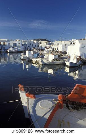 Stock Image -  Paros, Greek Islands, Greece, Naoussa, Cyclades, Europe, Fishing boats docked in Naoussa Harbor on Paros Island on the Aegean Sea.. Fotosearch