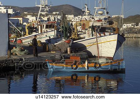 Paros, Greek Islands, Naoussa, Cyclades, Greece, Europe, Fishermen in fishing boat in Naoussa Harbor Paros Island on the Aegean Sea. View Large Photo Image Stock Photo - Paros, Greek Islands, Naoussa, Cyclades, Greece, Europe, Fishermen in fishing boat in Naoussa Harbor Paros Island on the Aegean Sea.. Fotosearch
