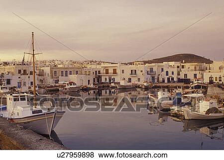 Paros, Greek Islands, Naoussa, Cyclades, Greece, Europe, Fishing boats docked in Naoussa Harbor on Paros Island on the Aegean Sea. View Large Photo Image Stock Photo - Paros, Greek Islands, Naoussa, Cyclades, Greece, Europe, Fishing boats docked in Naoussa Harbor on Paros Island on the Aegean Sea.. Fotosearch