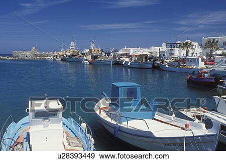 Paros, Greek Islands, Naoussa, Cyclades, Greece, Europe, Fishing boats docked in Naoussa Harbor on Paros Island on the Aegean Sea. View Large Photo Image Stock Photo - Paros, Greek Islands, Naoussa, Cyclades, Greece, Europe, Fishing boats docked in Naoussa Harbor on Paros Island on the Aegean Sea.. Fotosearch