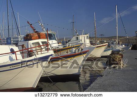 Stock Photo -  Paros, Greek Islands, Parikia, Cyclades, Greece, Europe, Fishing boats docked in the harbor of Parikia on Paros Island on the Aegean Sea.. Fotosearch