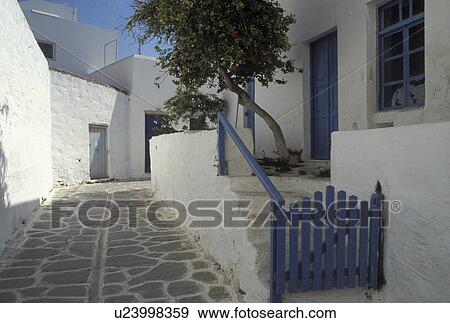 Paros, Greek Islands, Parikia, Cyclades, Greece, Europe, Typical home along a narrow walkway with whitewashed steps with blue railing and blue gate n Parikia on Paros Island. View Large Photo Image Stock Photo - Paros, Greek Islands, Parikia, Cyclades, Greece, Europe, Typical home along a narrow walkway with whitewashed steps with blue railing and blue gate n Parikia on Paros Island.. Fotosearch