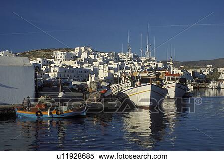 Stock Photography -  Paros, Naoussa, Greece, Greek Islands, Cyclades, Europe, Fishing boats docked in Naoussa Harbor on Paros Island on the Aegean Sea.. Fotosearch